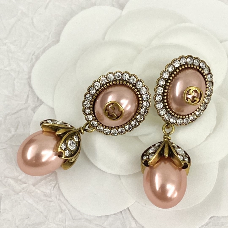 G*u*i earrings